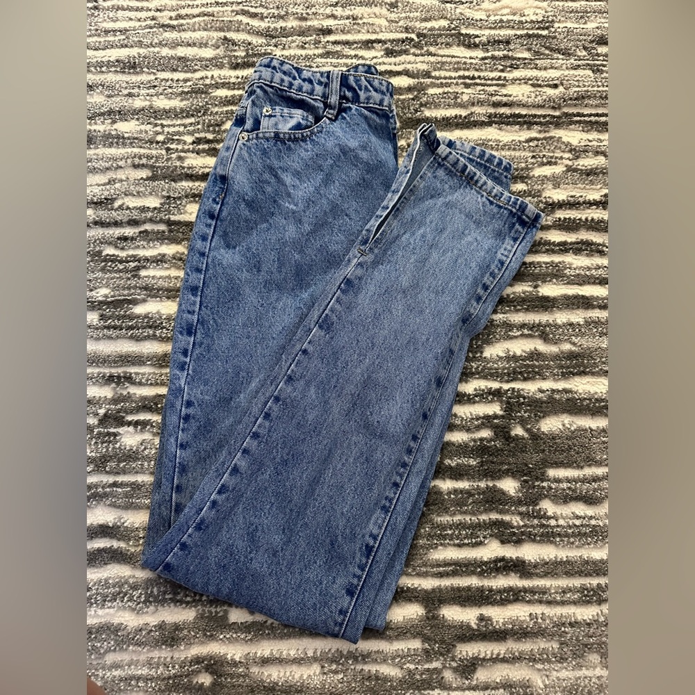 High waisted misguided jeans with slit at leg. Brand new with tags. Smoke free